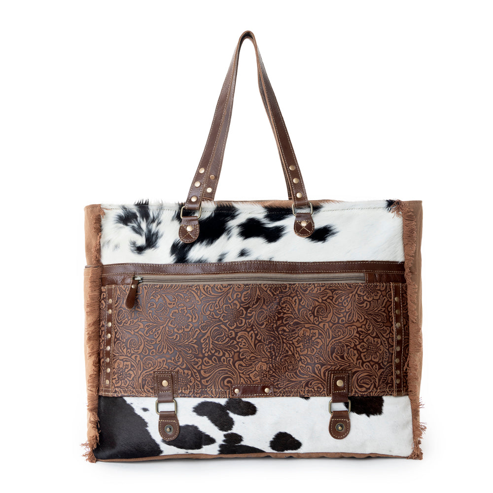 Myra Forester Junction Weekender Bag in tan with hair on and embossed leather