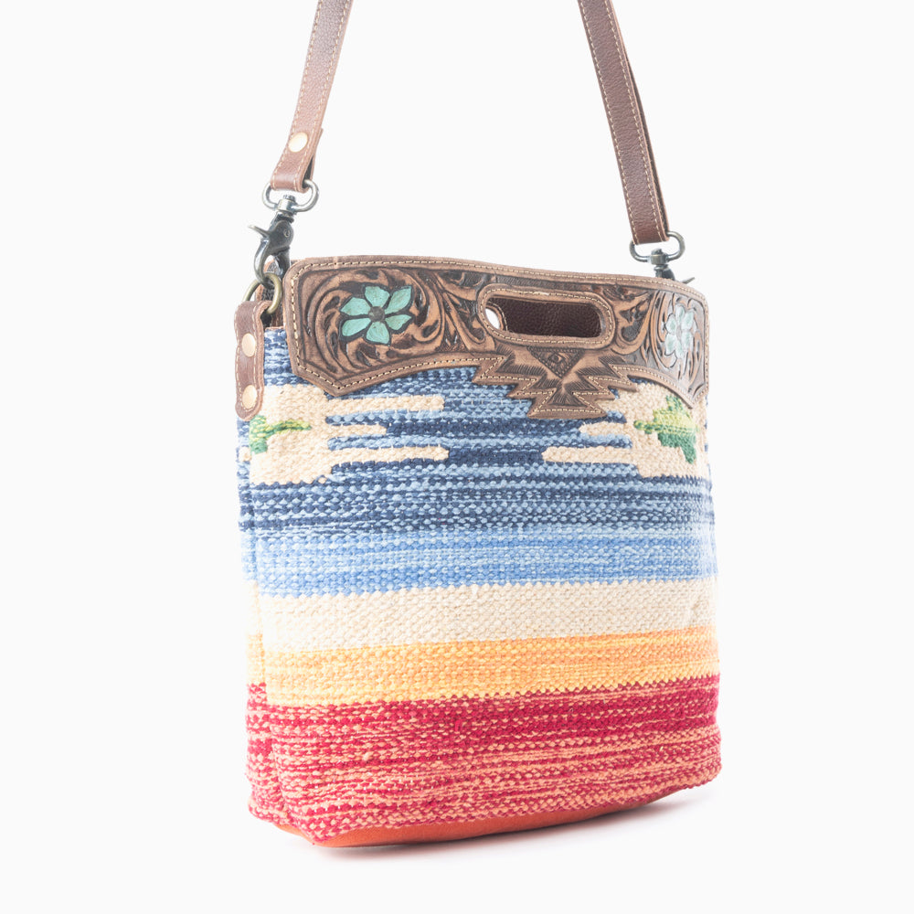 AZURE PETALS HAND TOOLED BAG.