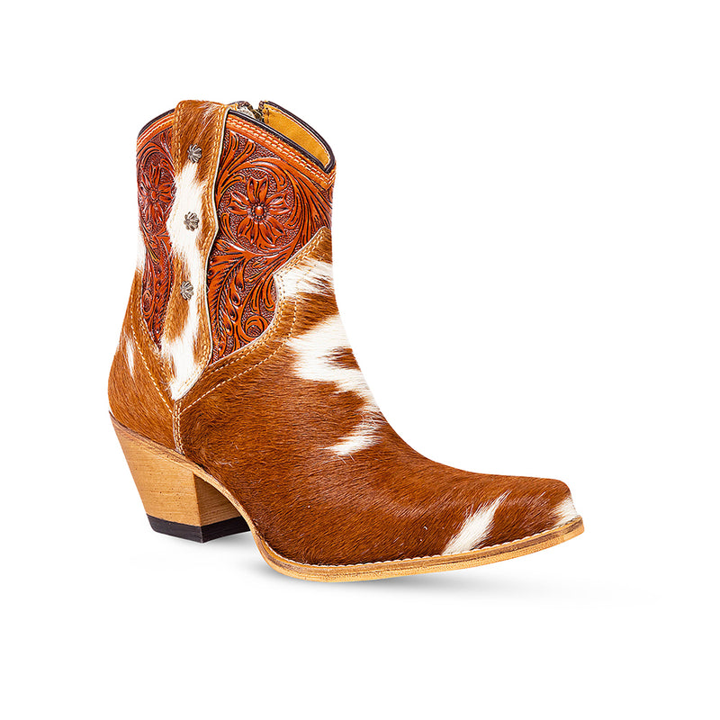 Brown and white cowhide & hand tooled western boots with slightly elevated heels and pointed toes