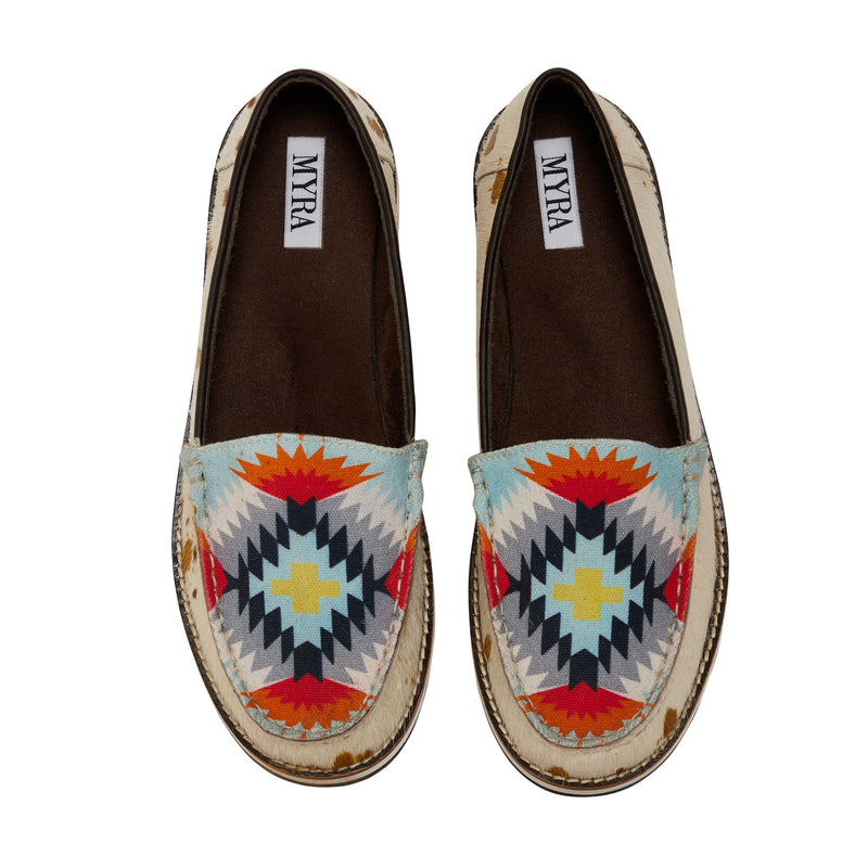 Western canvas shoes with aztec print in multiple colors, including shades of blue, orange, and white