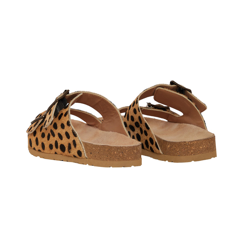 Handtooled leather sandals with a leopard print design and two straps across the top with adjustable buckles