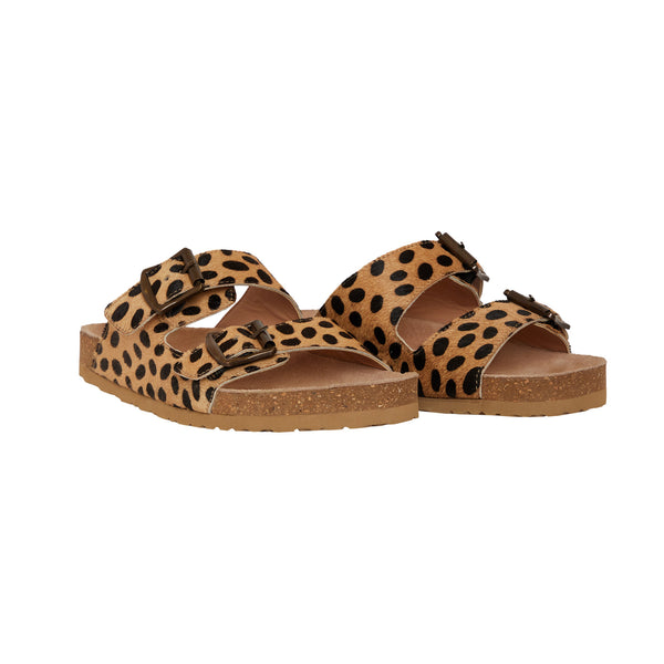 Handtooled leather sandals with a leopard print design and two straps across the top with adjustable buckles