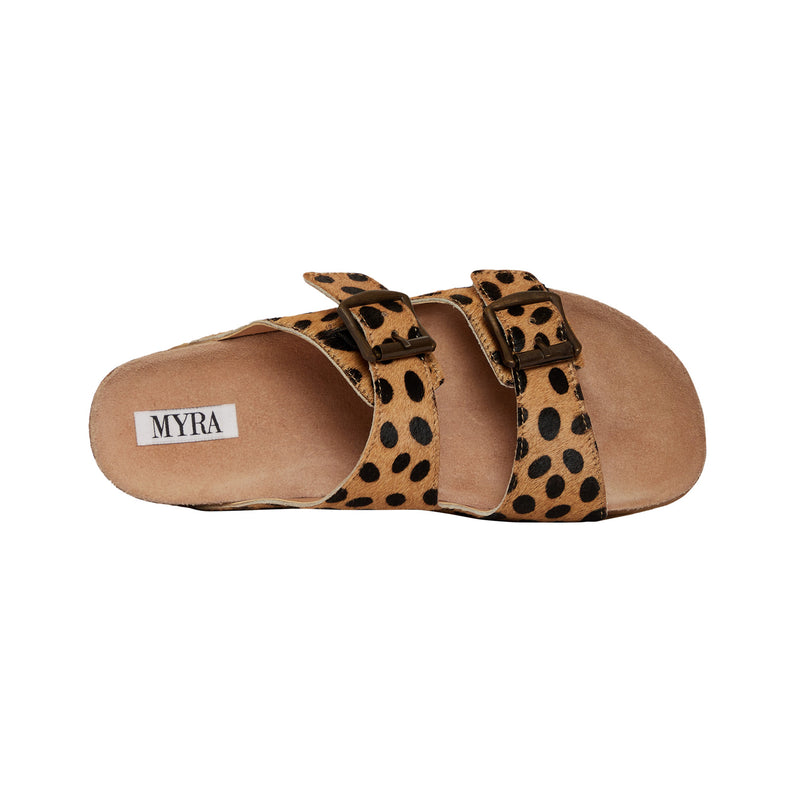 Handtooled leather sandals with a leopard print design and two straps across the top with adjustable buckles