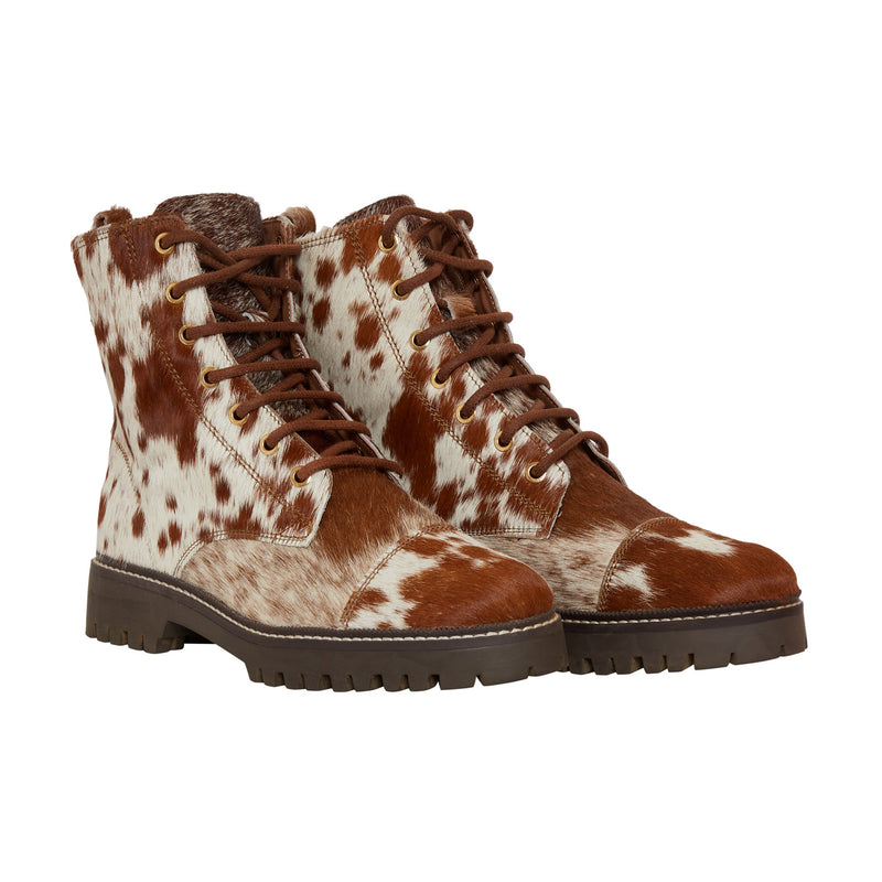 Women's Western Boots in brown and white cowhide pattern with brown laces