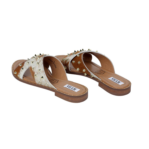 Trendy western sandals with an open-toe design in brown and white colour with numerous metallic spikes