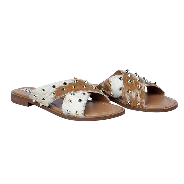 Trendy western sandals with an open-toe design in brown and white colour with numerous metallic spikes