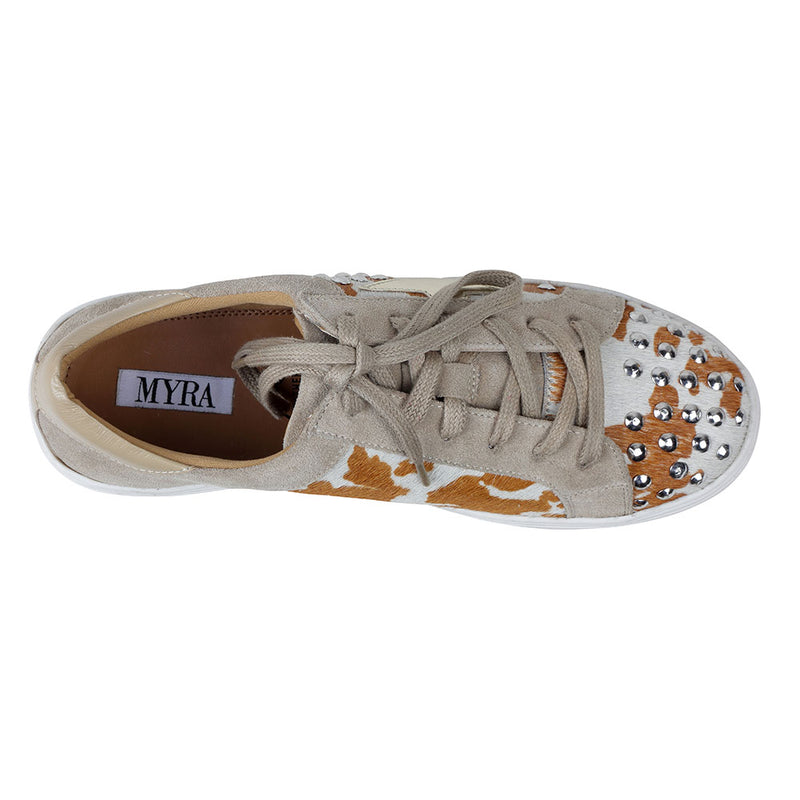 White low-top and lace-up western sneakers with small shiny studs and brown patches