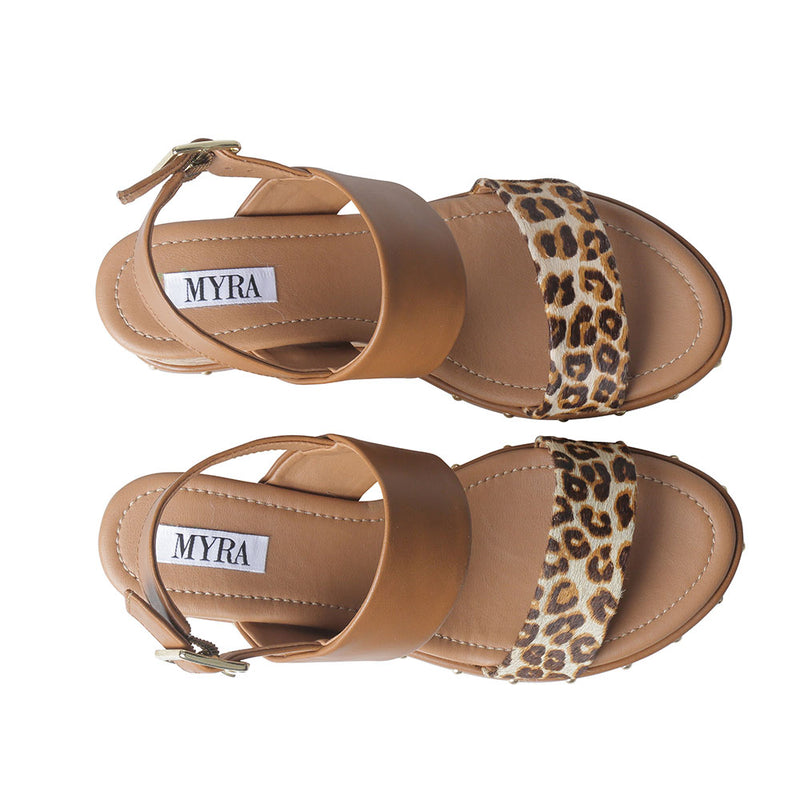 Trendy Sandals for Women with multiple straps and one strap featuring a leopard print design.