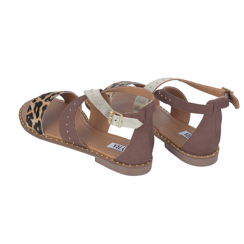 Western sandals with open-toe design in a combination of solid brown, tiger print, and metallic strap details