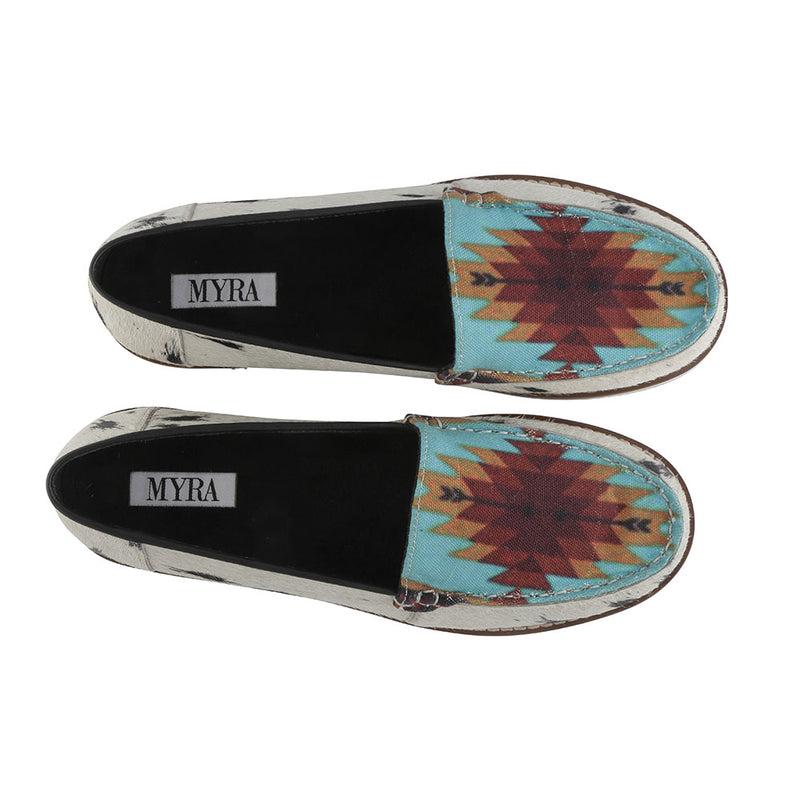 western sneaker with white hairon leather and black speckles and a colorful geometric pattern on the top