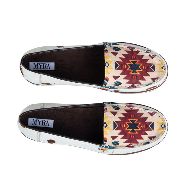 Western sneakers with aztec print in multiple colors such as red, yellow, blue, and white