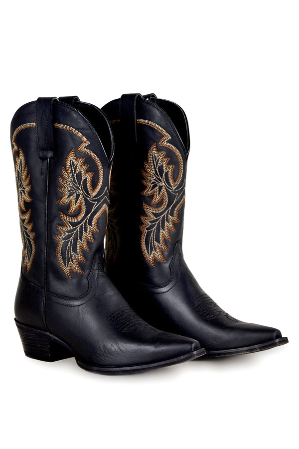 Black cowgirl boots with golden stitching on the shafts