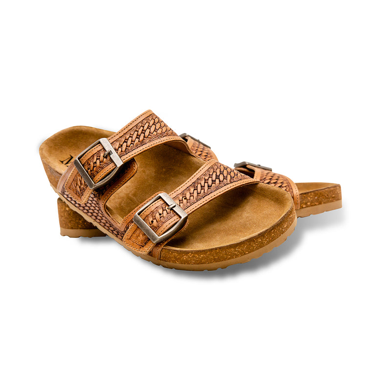 Handtooled sandals for women with brown sole and two straps over the top